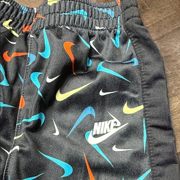 Nike Kids' Black Tracksuit with Vibrant Swooshes - Picture 6 of 7